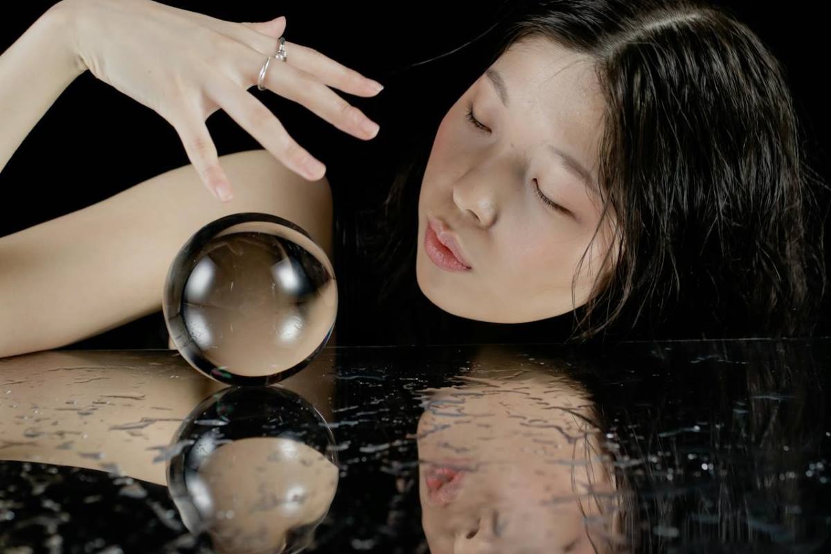 Photo: 
cottonbro studio via <a href="https://www.pexels.com/photo/fortune-teller-reading-from-a-crystal-ball-on-a-mirror-table-8243789/" rel="noopener" target="_blank">Pexels</a>