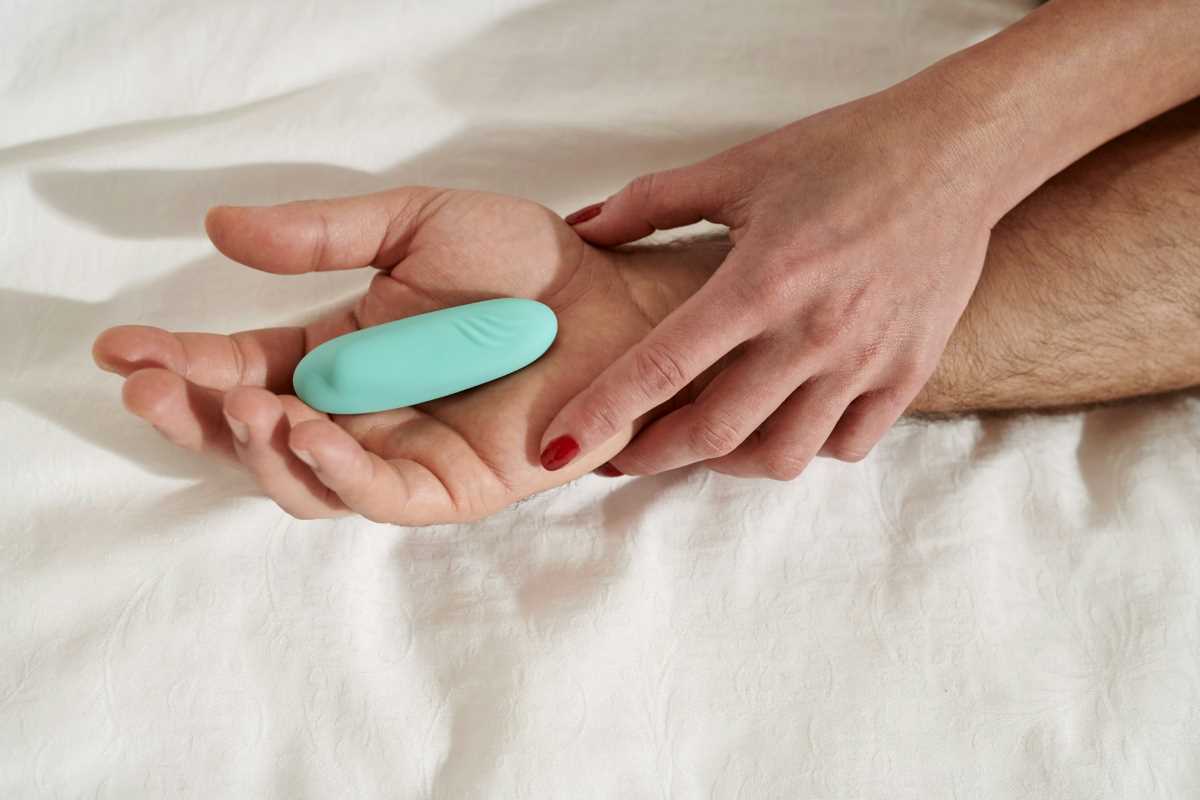 Photo: We-Vibe Toys via <a href="https://unsplash.com/photos/persons-hand-on-white-textile-J39qG9mXcZ0" rel="noopener" target="_blank">Unsplash</a>